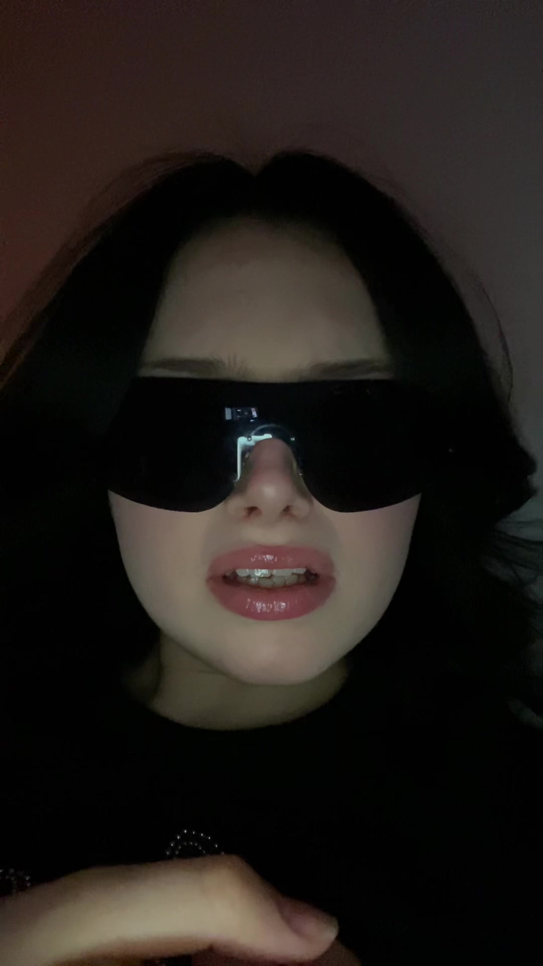 Kris confused in dark sunglasses