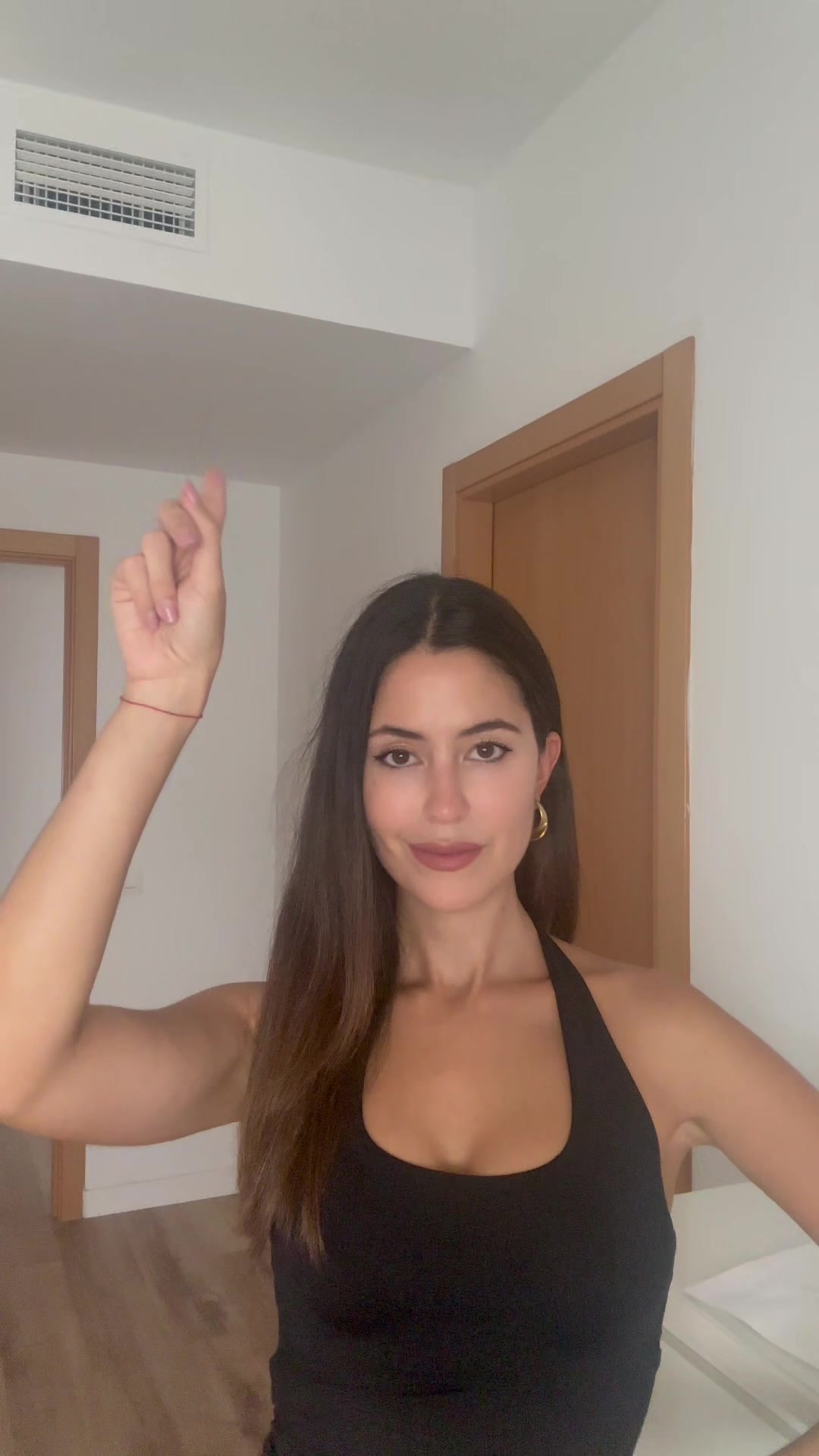 Woman makes 'thinking' gesture