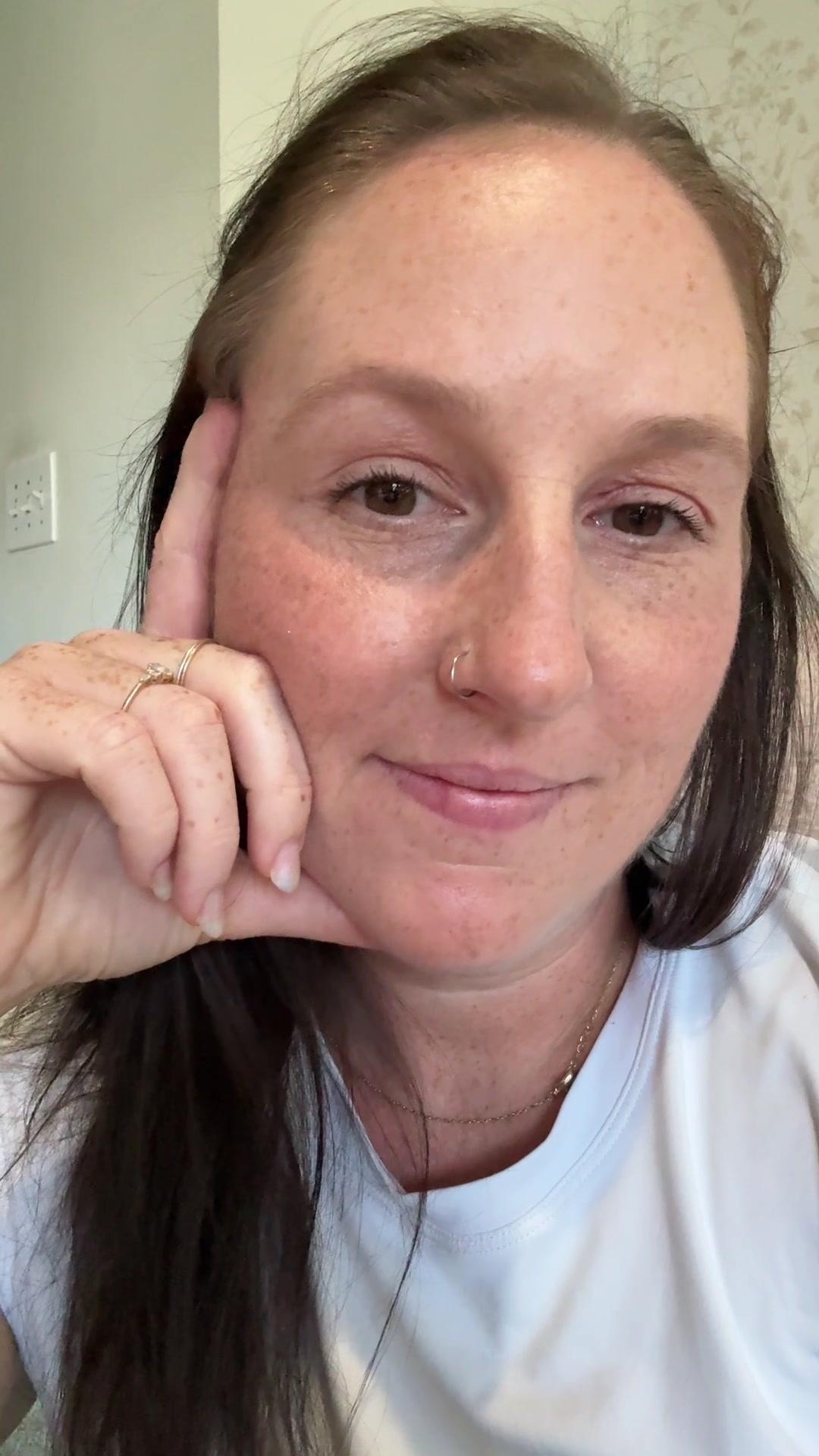 Amused Woman Giggles at Camera