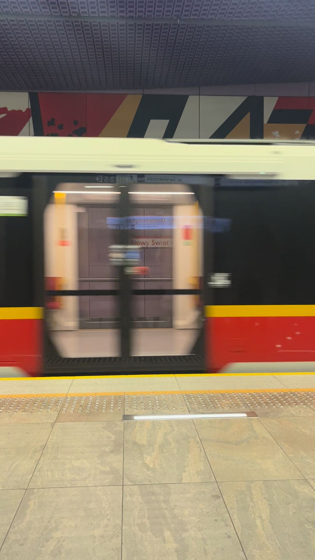 Couple waiting for train together
