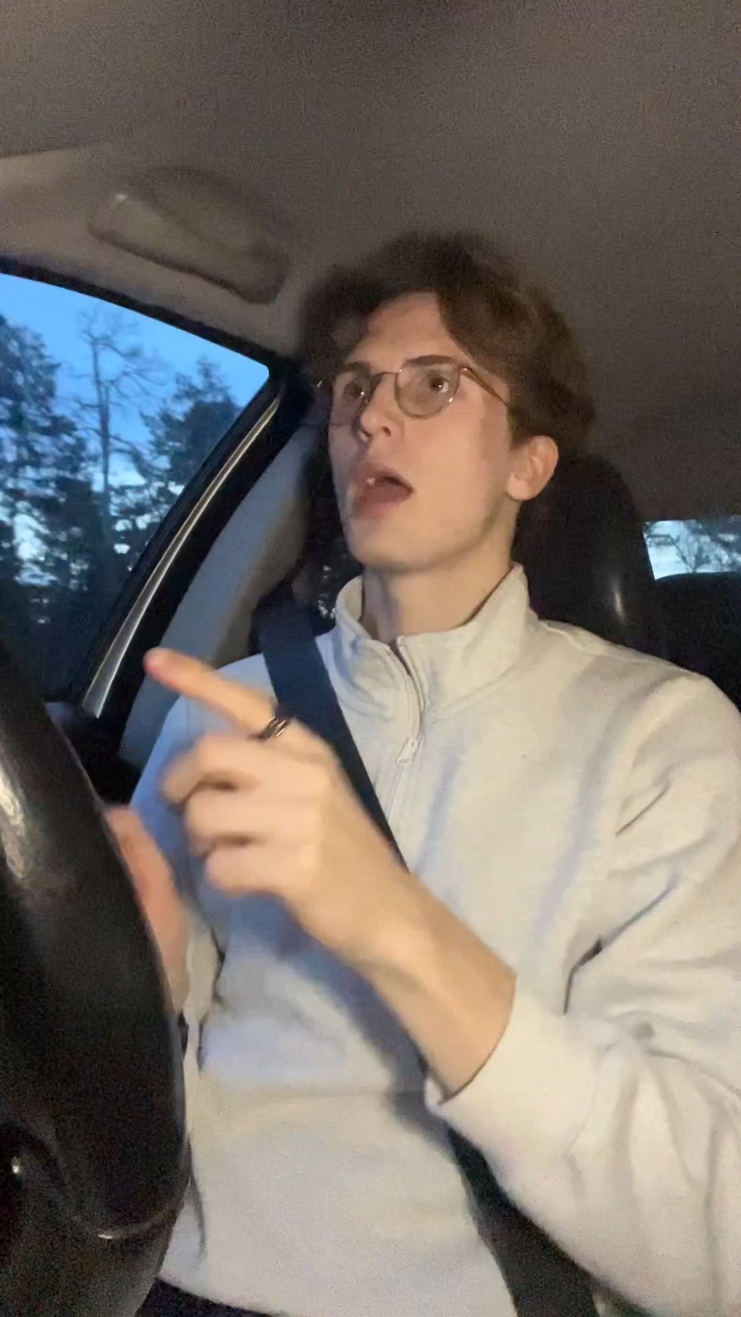 Young Man Driving and Singing