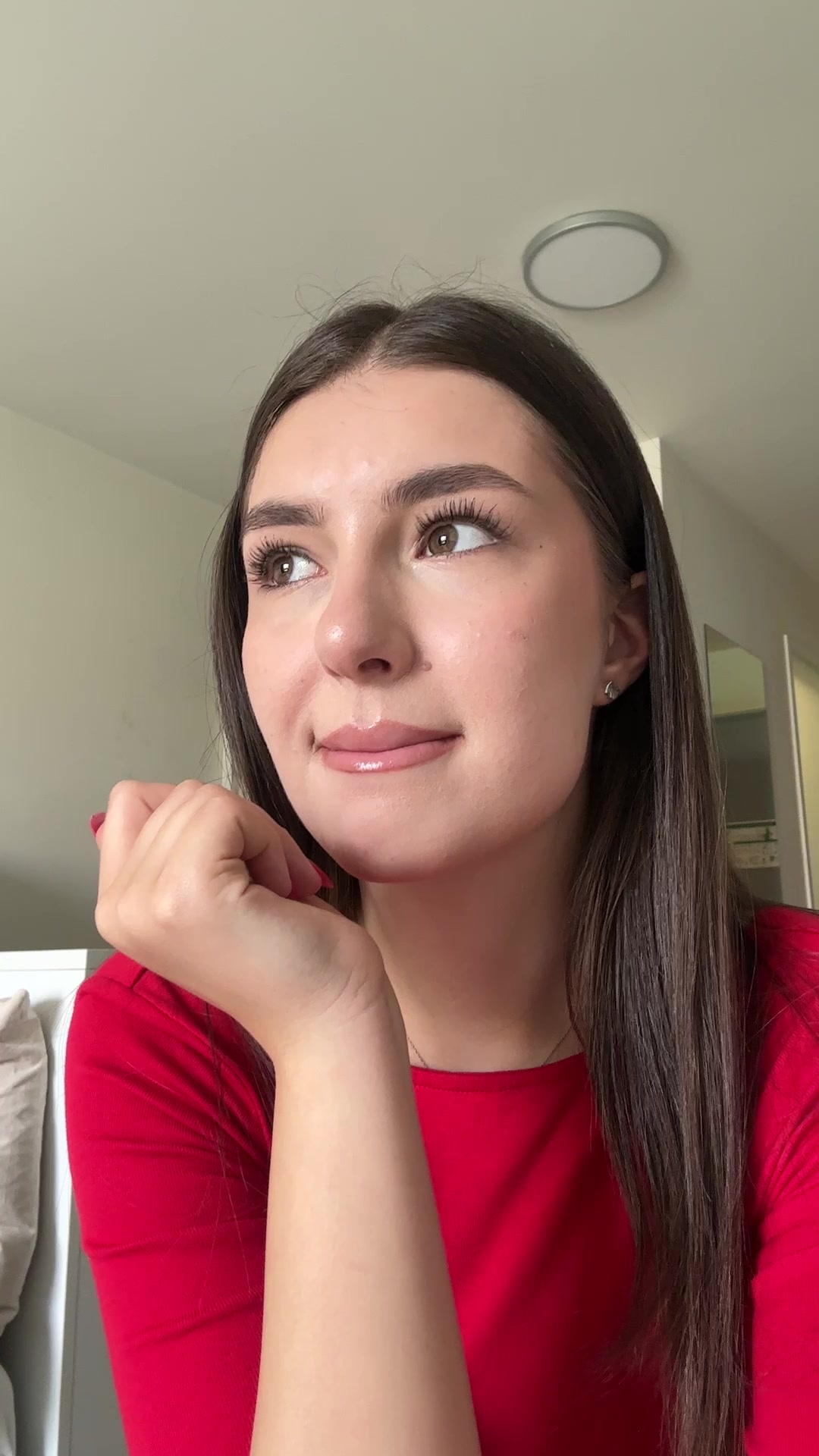 Woman with Gentle Smile and Thoughtful Gaze