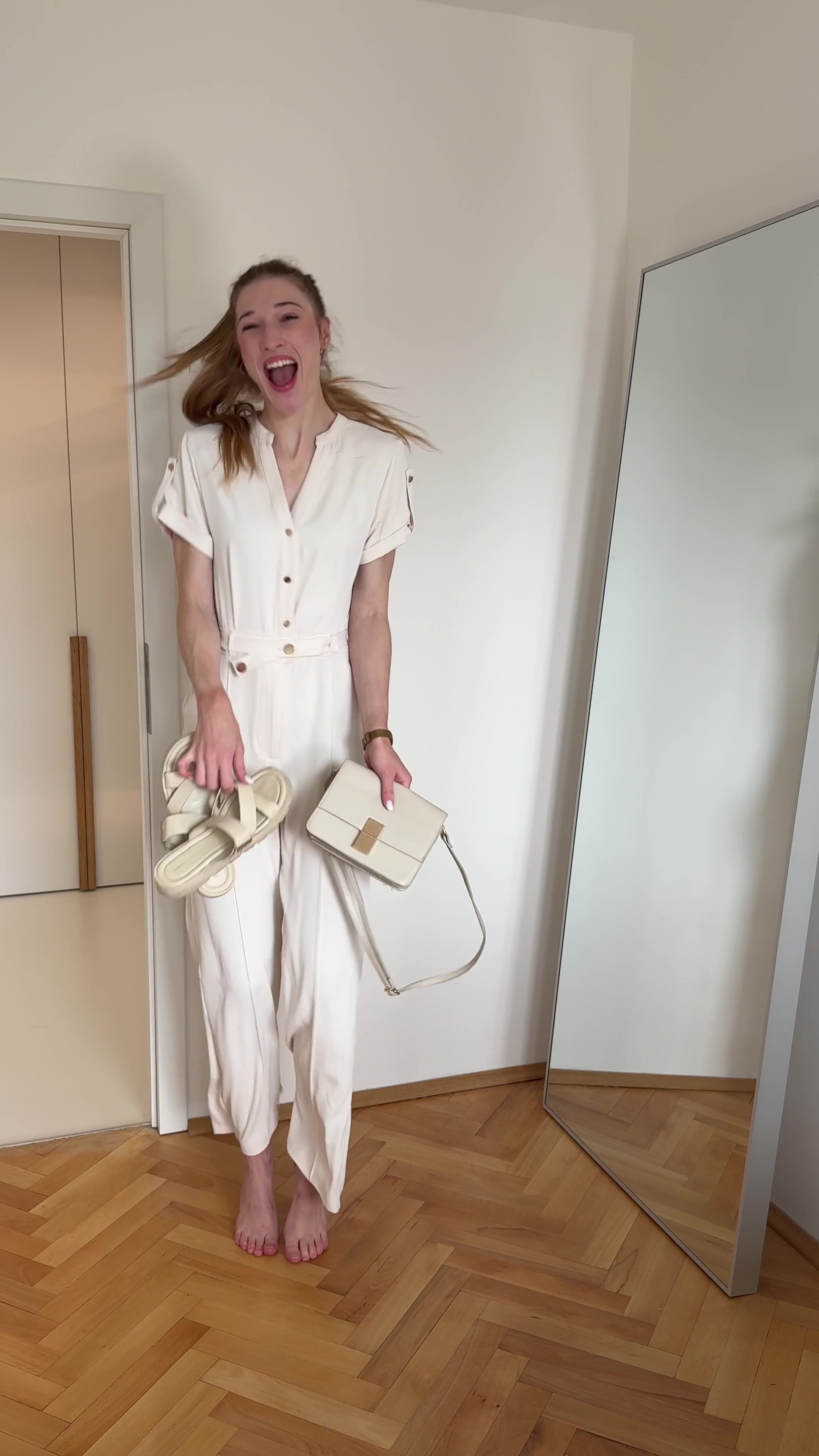 Woman tries on new sandals and bag