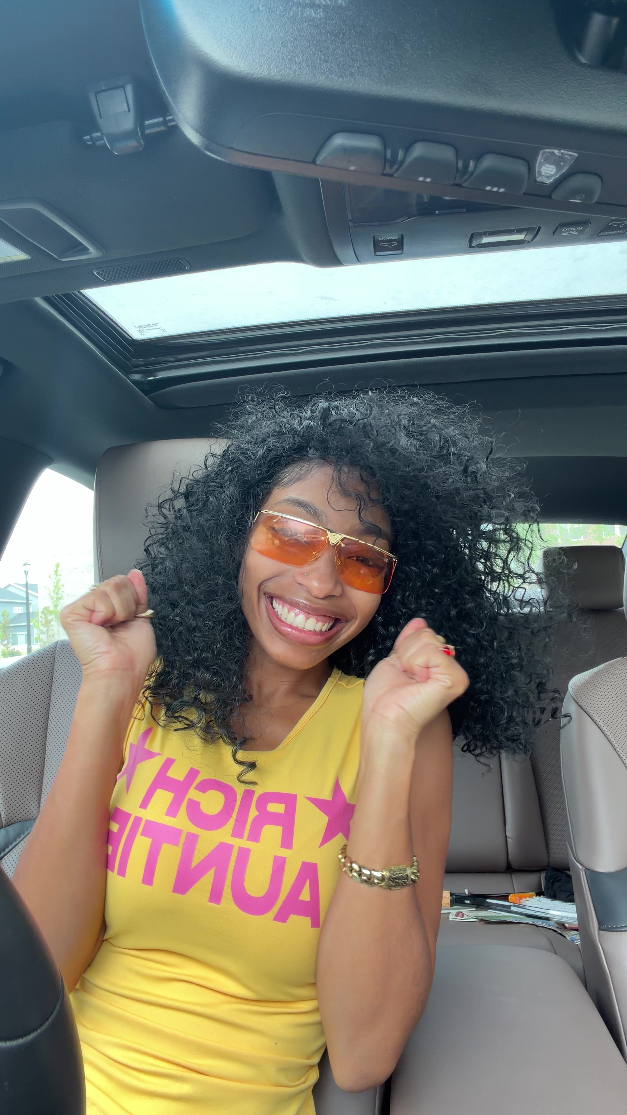 Happy Woman Clapping Joyfully in Car
