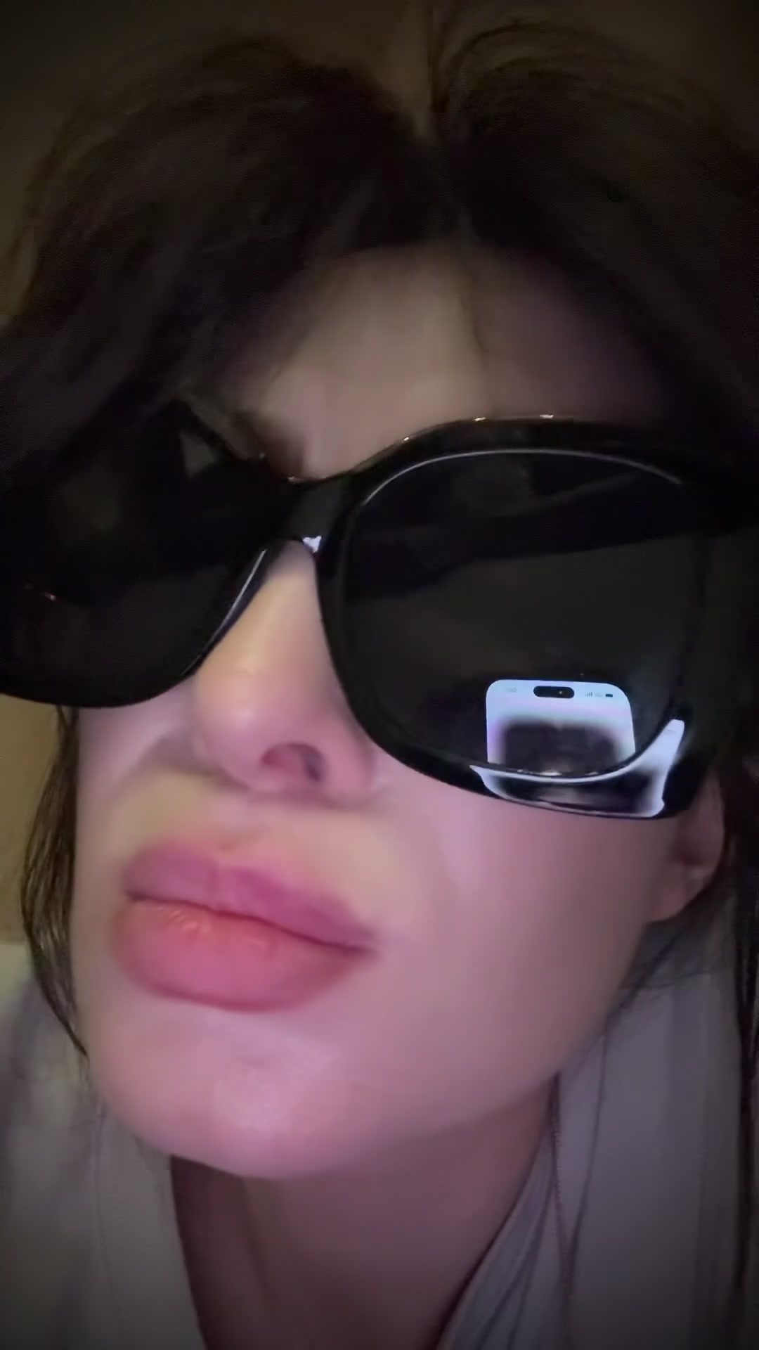 Woman makes playful pouting face
