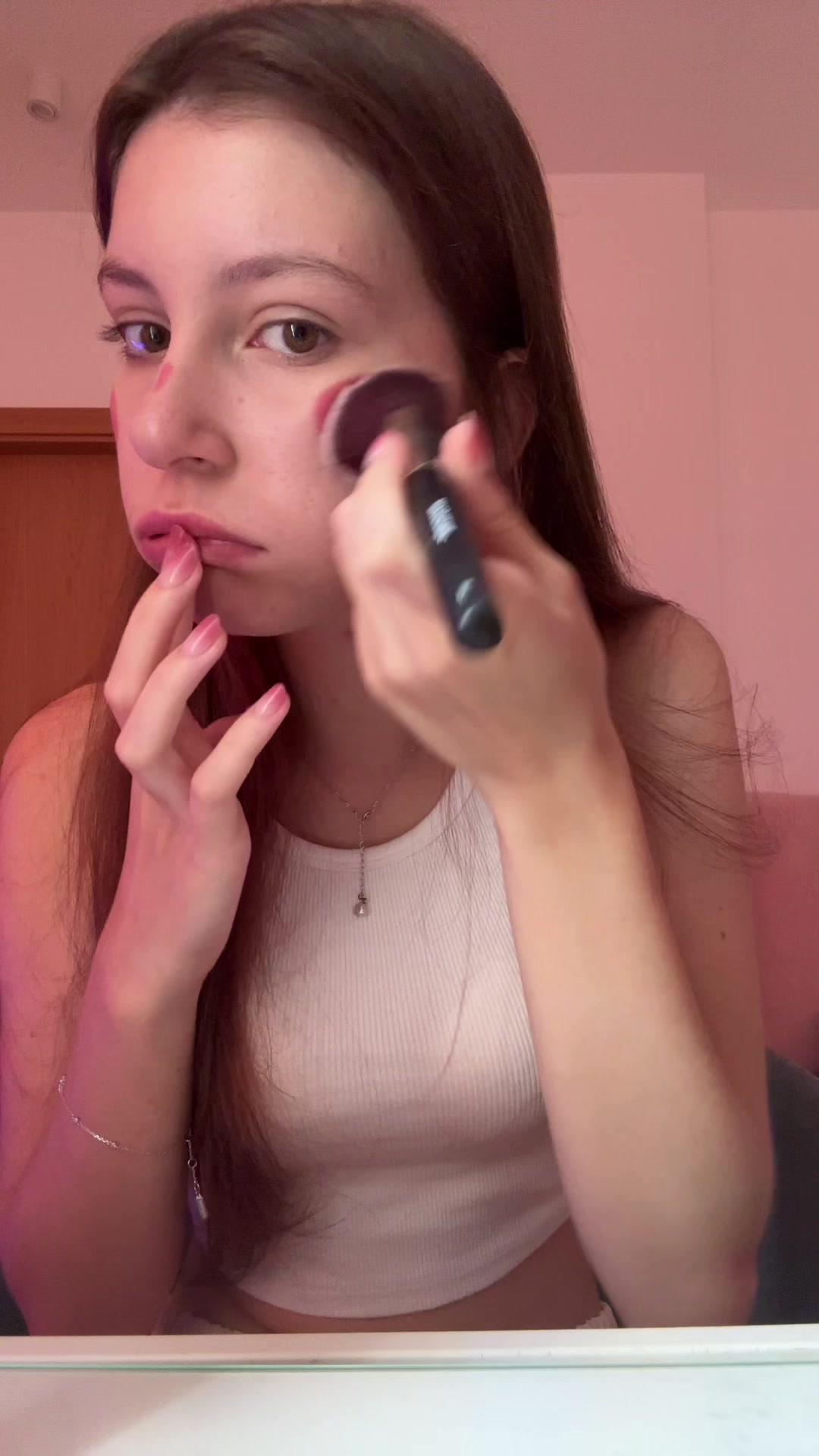 Surprised Reaction During Makeup Application