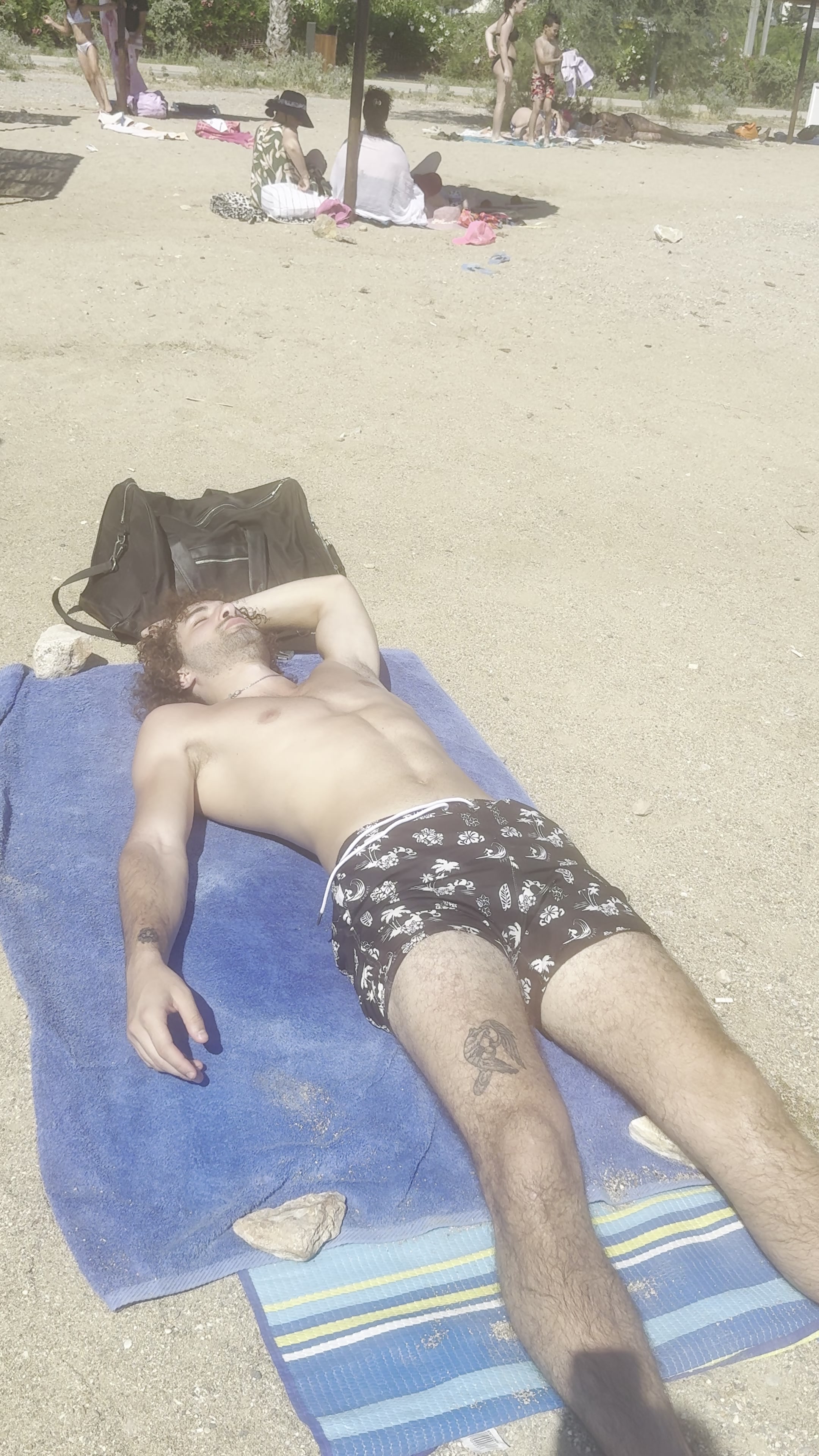 Man relaxing on a sunny beach