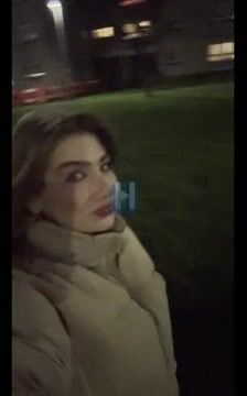 Woman Reacts to Something Outside