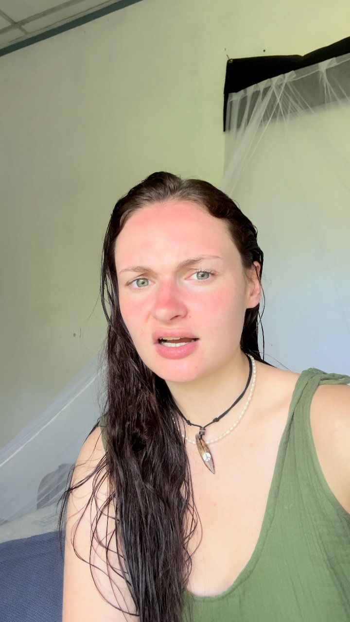 Woman reacts to something funny