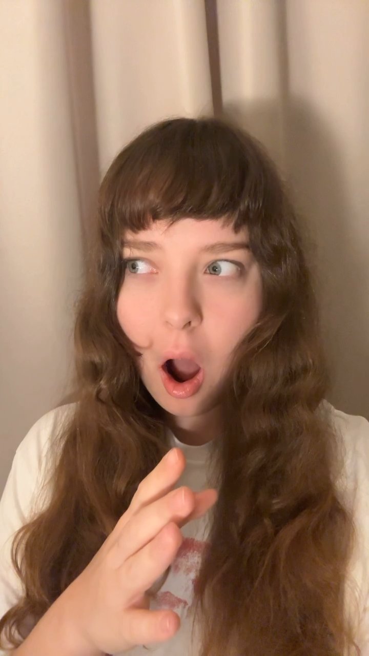 Woman Reacts with Amazement and Surprise